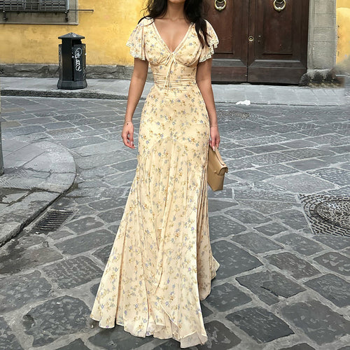 Dame maxikjole med romantisk blomsterdesign og leken V-hals Skjora