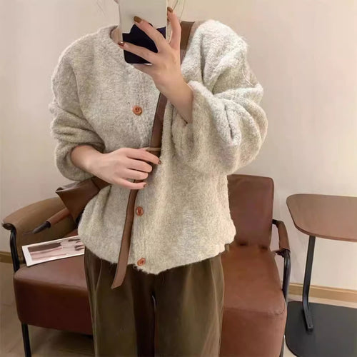 Kvinnes koselige cardigan med knappedetaljer og løs passform Skjora