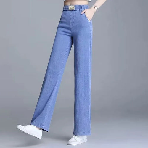 Kvinne Loose Jeans med Elastisk Liv og Praktiske Lommer Skjora