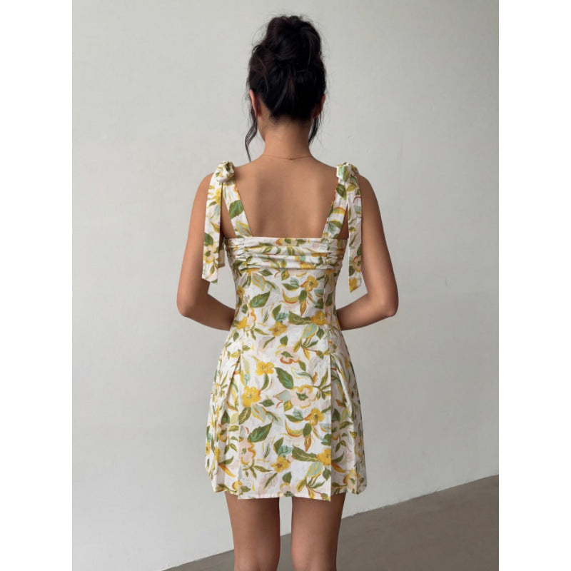 Dame minikjole med ermeles bånd og blomsterdesign Skjora