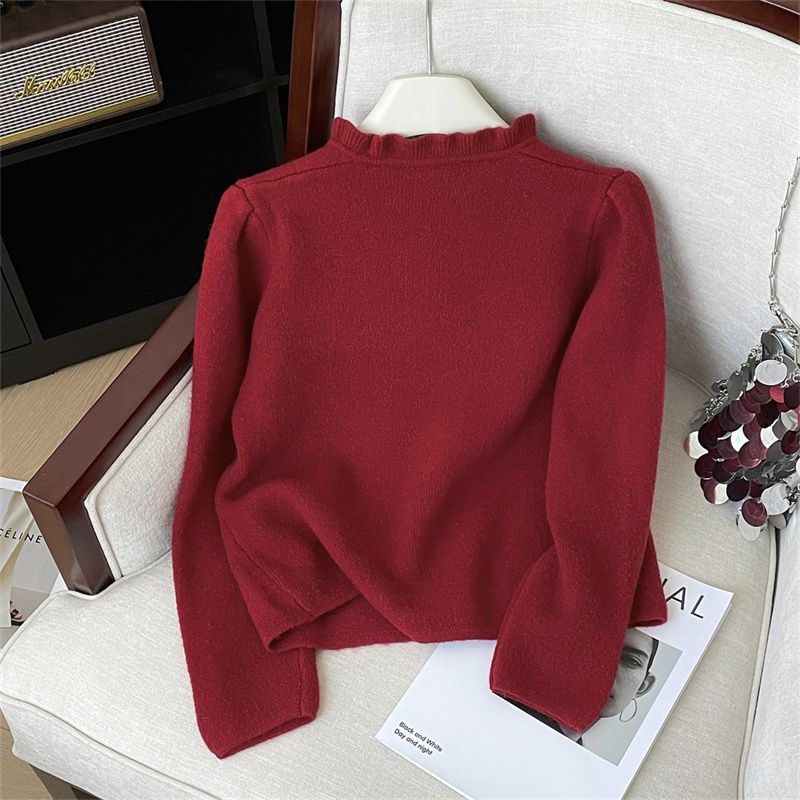 Damer elegant cardigan med feminine volanger og perleknapper Skjora