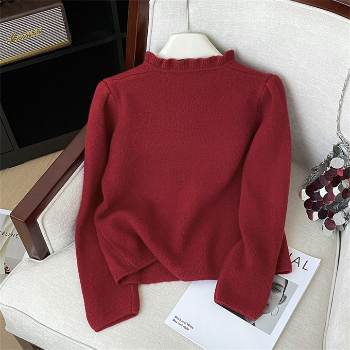 Damer elegant cardigan med feminine volanger og perleknapper Skjora