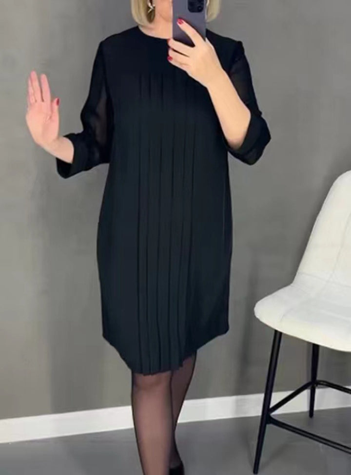 Kvinne elegant volangkjole med transparente ermer Skjora