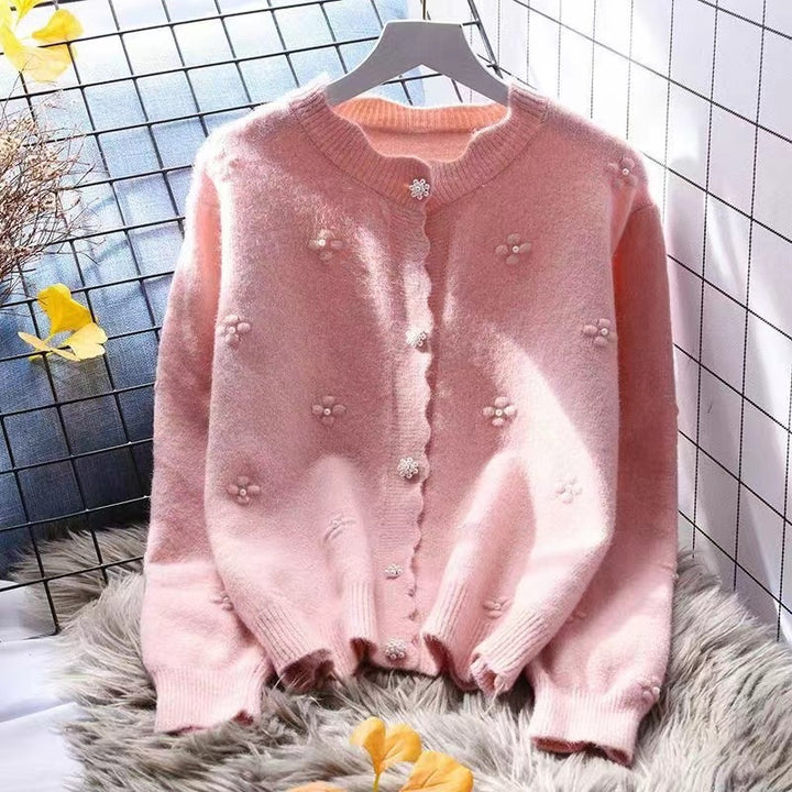 Kvinnenes koselige cardigan med blomsterapplikasjoner Skjora