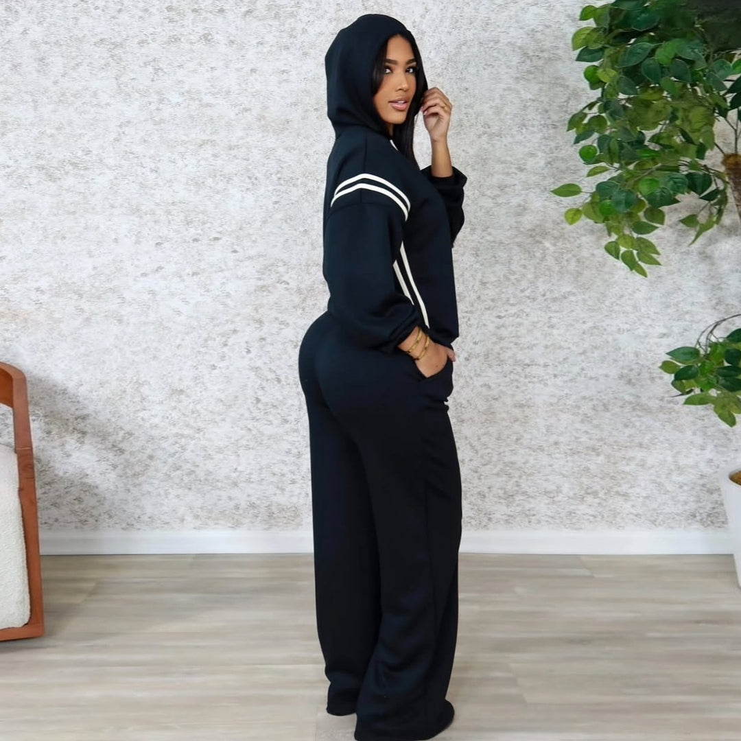 Dame sporty loungewear-set med oppbrettede ermer og sidestreker Skjora