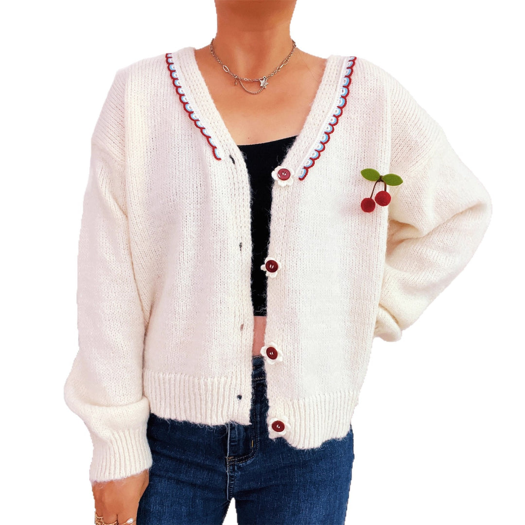 Dame koselig cardigan med lekent blomsterdesign og knappedetaljer Skjora