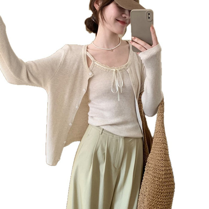 Kvinnelig uformell cardigan med fashionable knappedetaljer og forlengede ermer Skjora