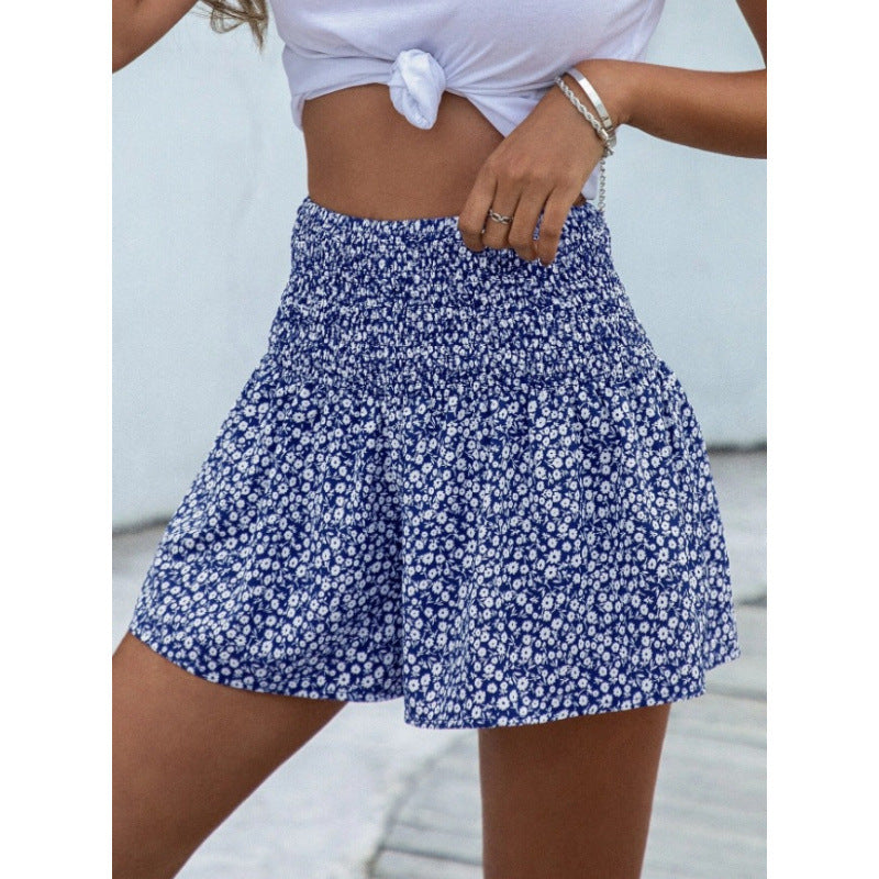 Dame shorts med elastisk midjebånd og blomsterdesign Skjora