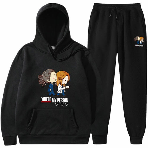 Damegenser og joggebukse sett med originalt tegneseriedesign Skjora