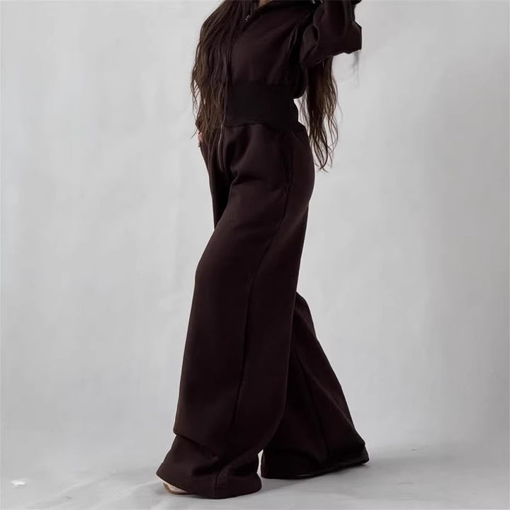 Kvinne jumpsuit med hette og vid ben Skjora