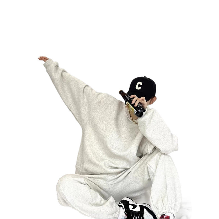 Kvinnens komfortable oversized genser og joggebukse sett med elastisk midje og sidelommer Skjora