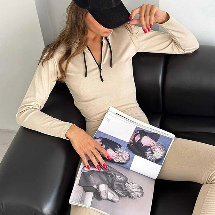 Kvinnenes sporty langermet jumpsuit med glidelås og figurnær passform Skjora