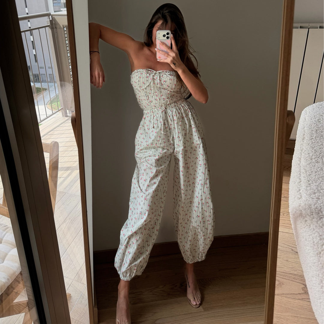 Dame jumpsuit med lekent blomstermønster og elastisk midje snor Skjora