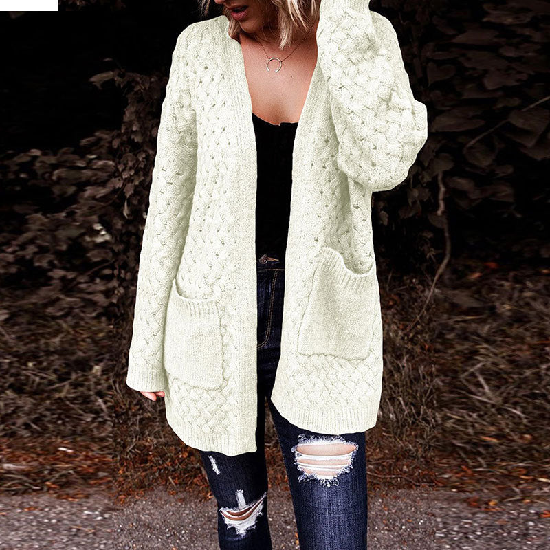 Dame cardigan med teksturert mønster og praktiske lommer Skjora