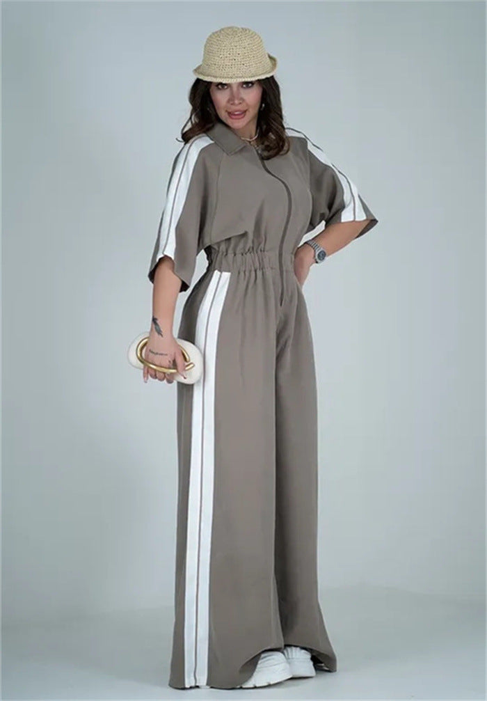 Kvinnenes lange jumpsuit med belte og kontraststriper