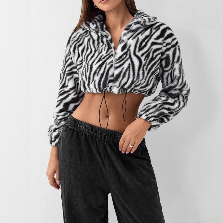 Dame cropped Fleece-jakke med moderne zebra-design og elastiske mansjetter Skjora