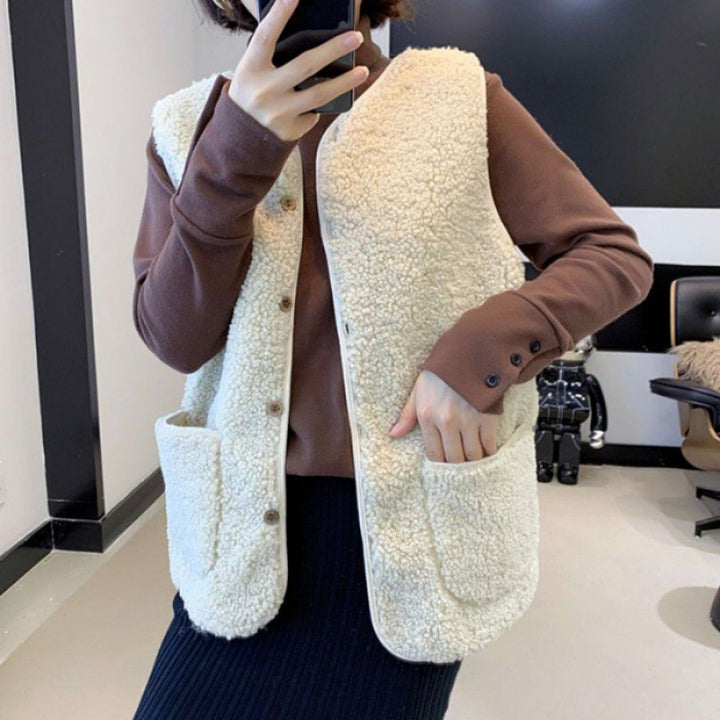 Damer teddy fleece vest med praktiske lommer og knaplukning Skjora
