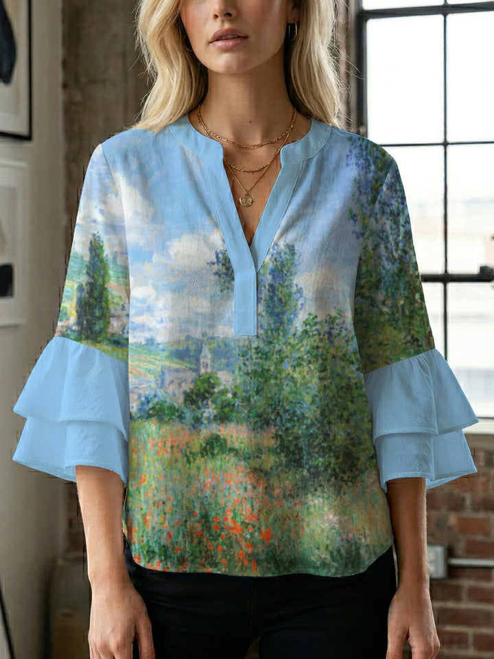 Dame uformell bluse med volangerm og botanisk trykk Skjora