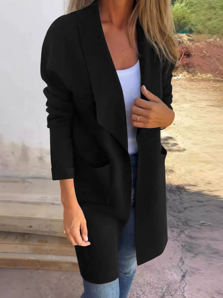 Women's casual oversized jacket with side pockets and an open collar Skjora