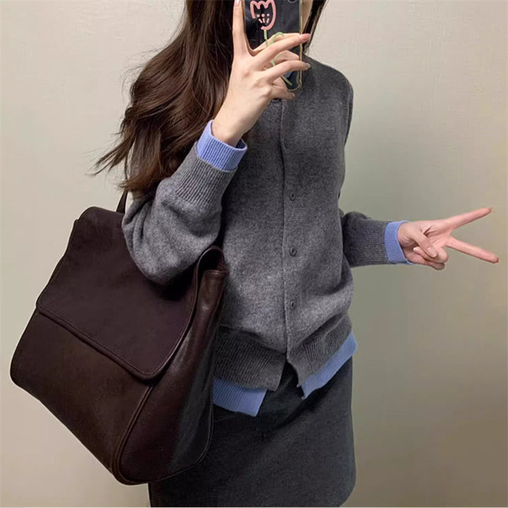 Kvinnenes elegante strikkede cardigan med fine kontrastdetaljer Skjora