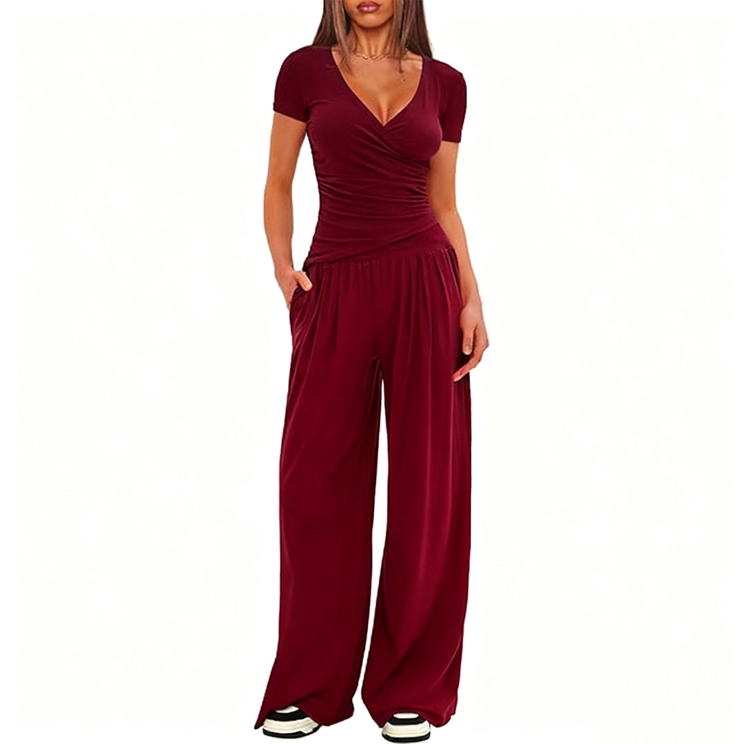Dame avslappet jumpsuit med omslagsdesign og vid ben Skjora