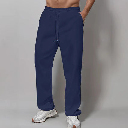 Herre Sporty Avslappet Passform Joggebukser med Elastisk Liv og Sidelommer Skjora