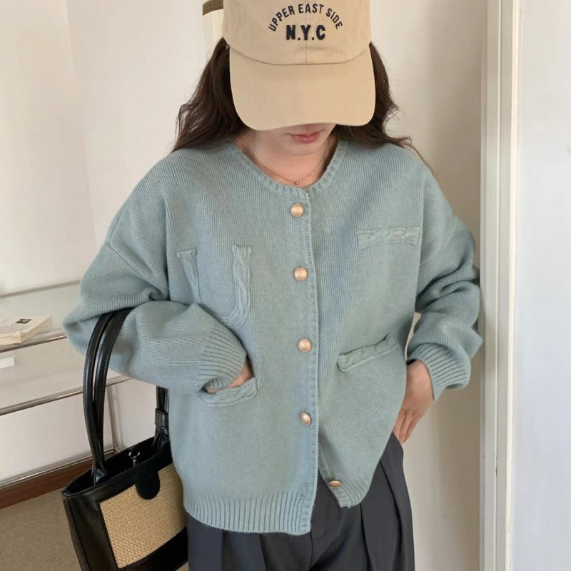 Dame cardigan med knappe detaljer og romslige lommer Skjora