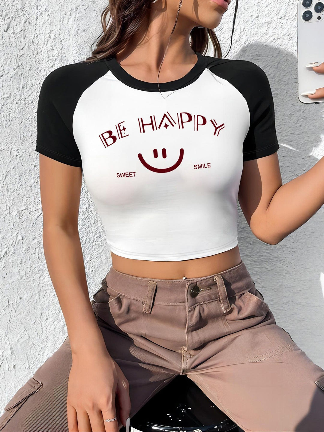Dame crop-top med motiverende tekst og avslappet snitt Skjora