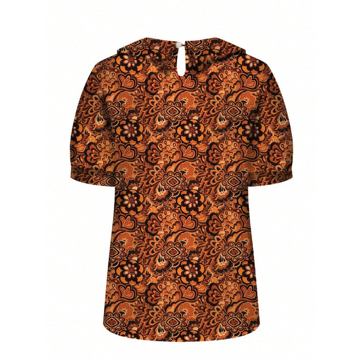 Dame kortermet bluse med florale accenter og klassisk krage Skjora