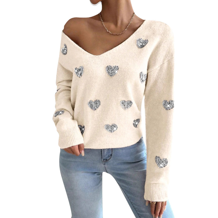 Kvinnelig oversized genser med dyp V-hals og hjerte motiver Skjora