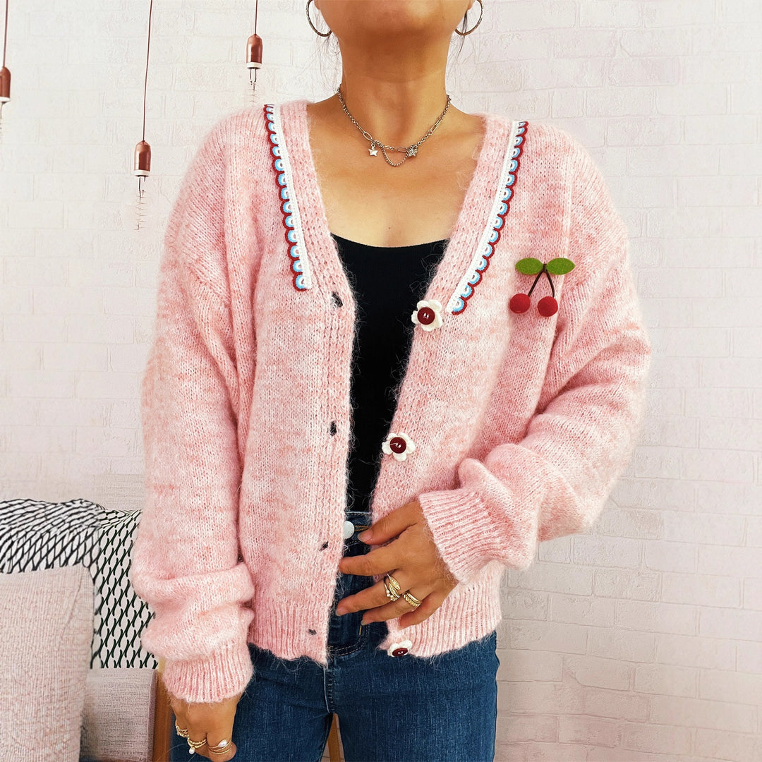 Dame koselig cardigan med lekent blomsterdesign og knappedetaljer Skjora