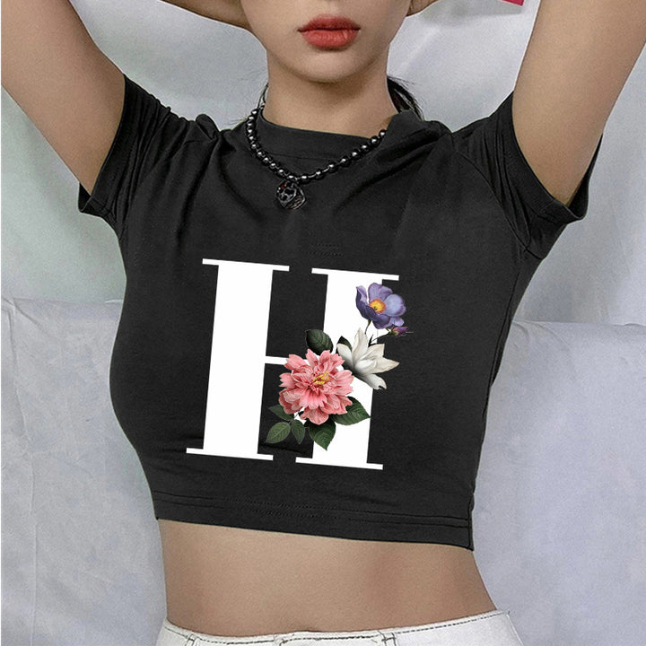 Dame cropped T-skjorte med blomstrede initialdesign Skjora
