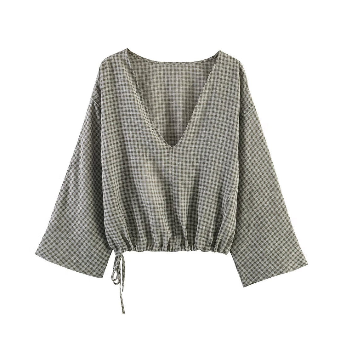 Damer casual bluse med vid V-hals og elastisk kant Skjora