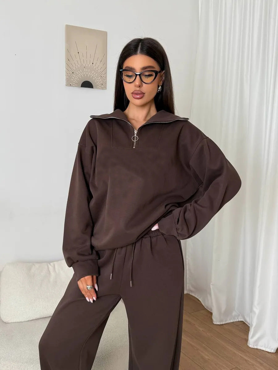 Kvinnens elegante fleece treningsoverall med høy krage og praktisk glidelås