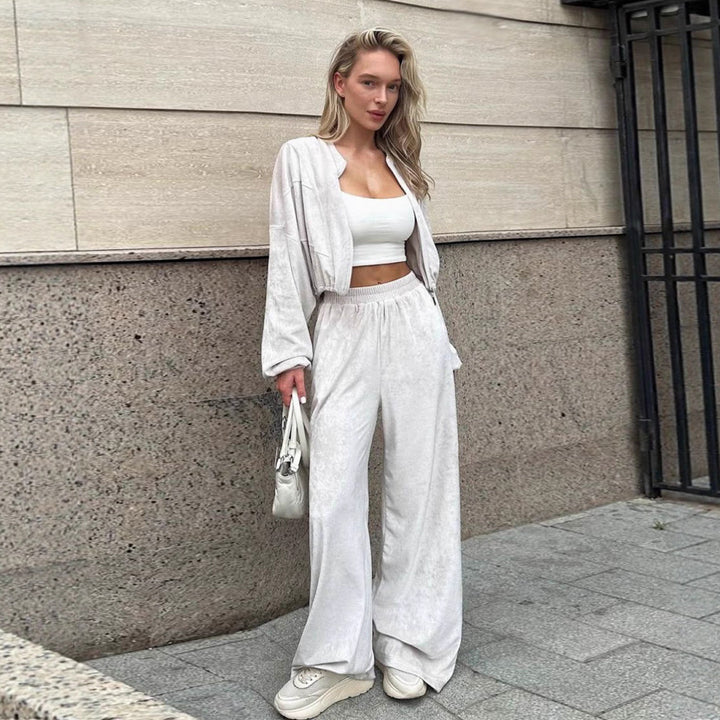 Kvinnes sportlige loungewear-jakke med glidelås og trendy vide bukser Skjora