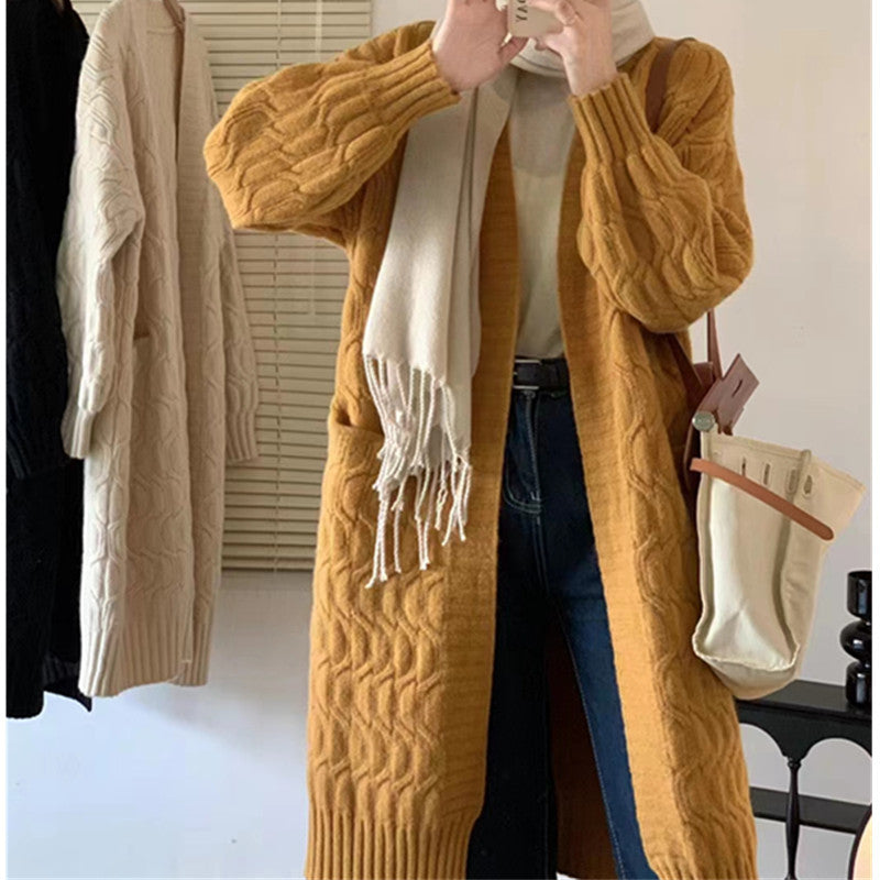 Kvinnelig chunky strikket cardigan med lommer og V-hals Skjora