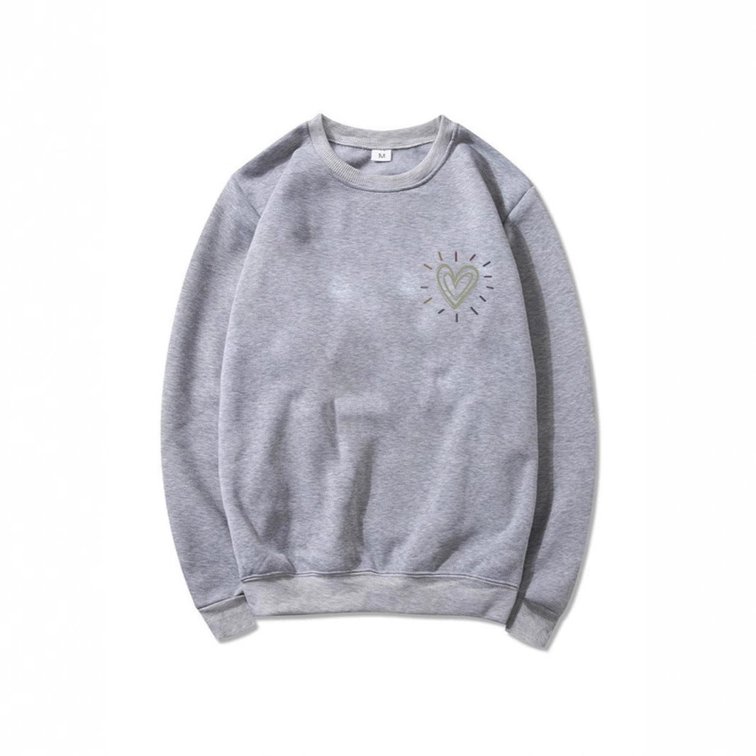Dame Oversized Sweatshirt med søtt hjerte-motiv og avslappet snitt Skjora