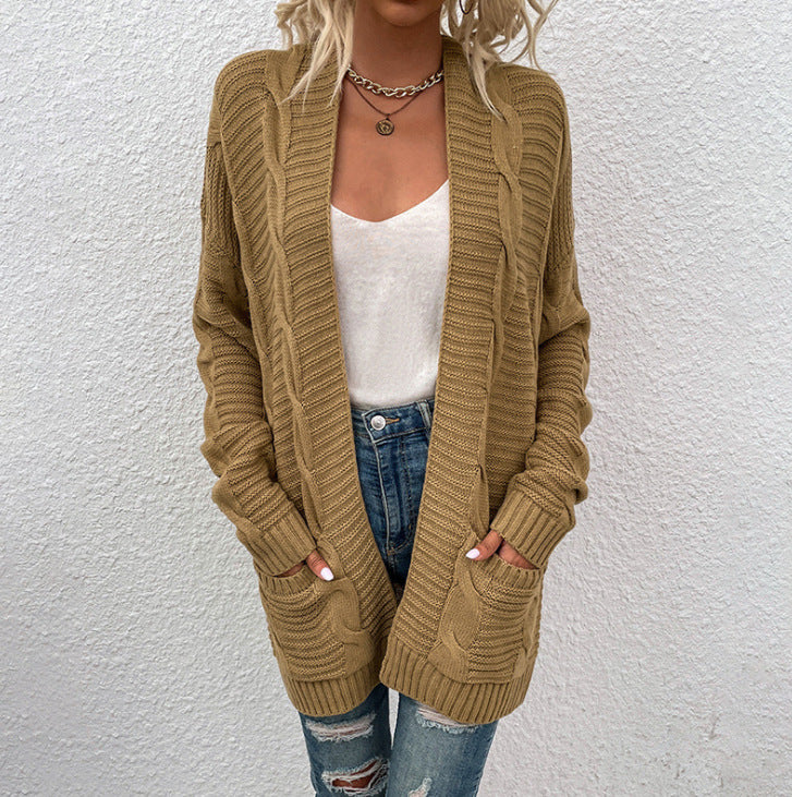 Kvinne chunky strikk cardigan med lommer og åpen frontdesign Skjora