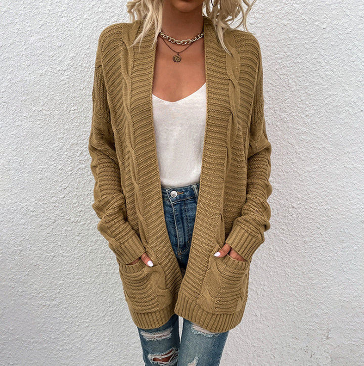 Kvinne chunky strikk cardigan med lommer og åpen frontdesign Skjora
