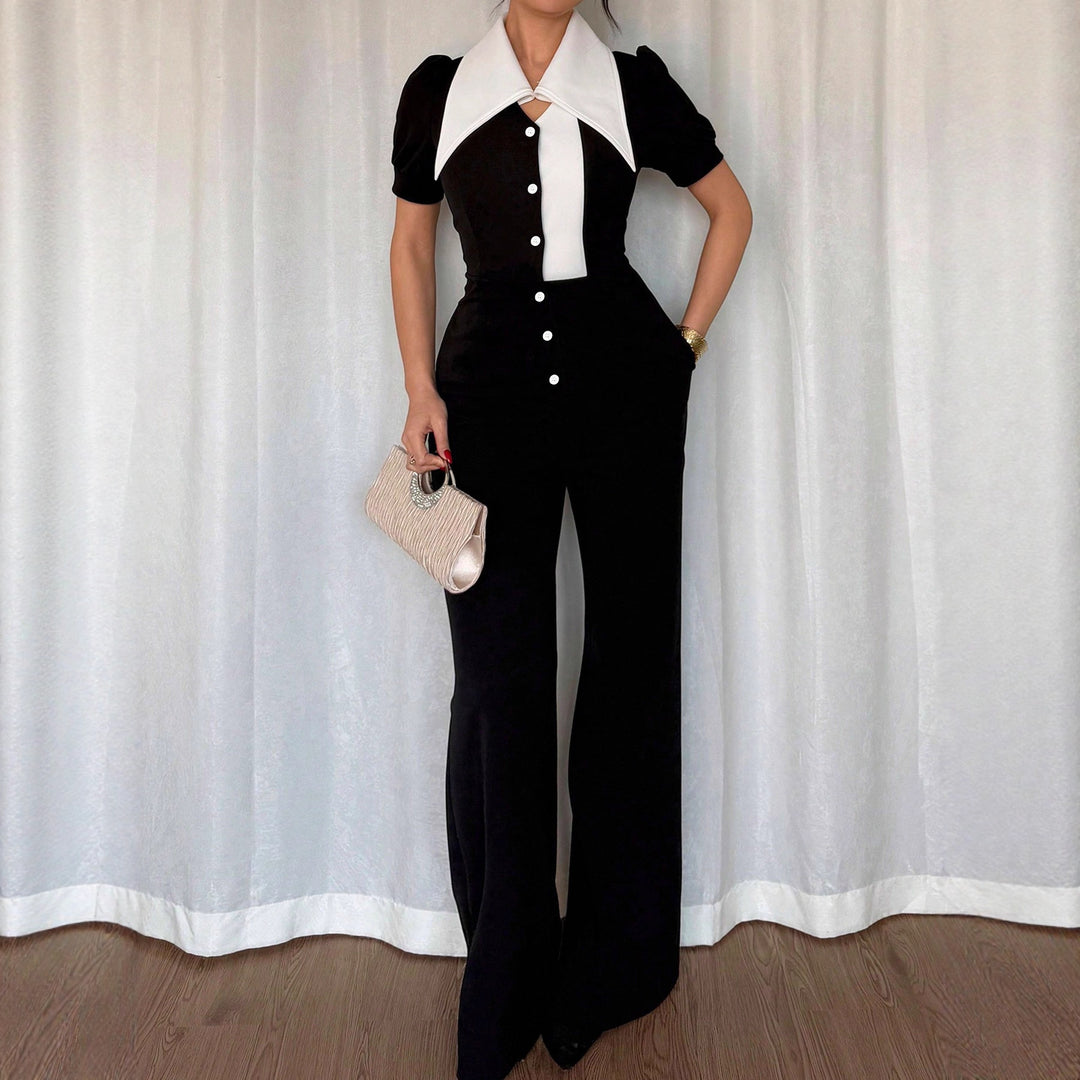 Dame jumpsuit med elegant krage og figurnær passform Skjora