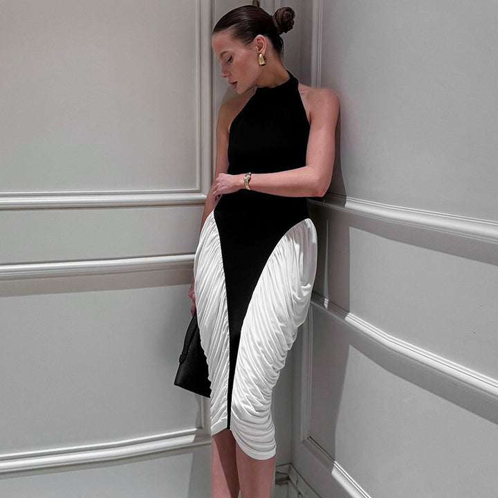 Damer Elegant aftenkjole med dyp ryggutskjæring og innovativ draperingsdesign Skjora
