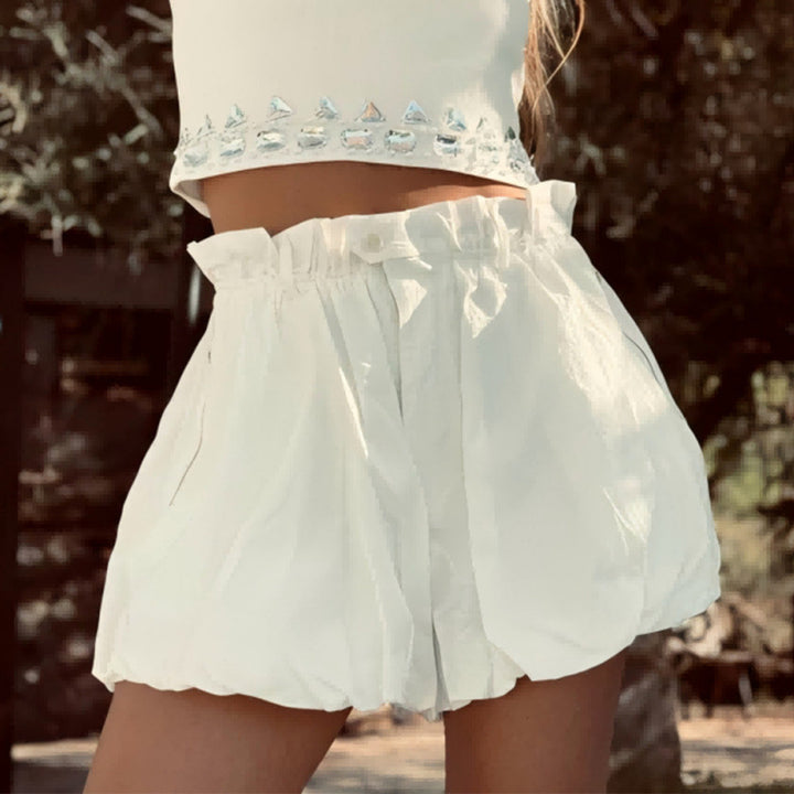 Dame moteriserte shorts med elastisk midje og dekorativ volangkant Skjora