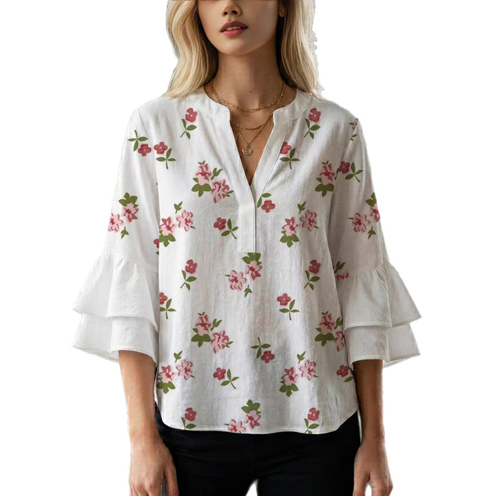 Dame bluse med voluminøse rysjermer og moderne motiv Skjora
