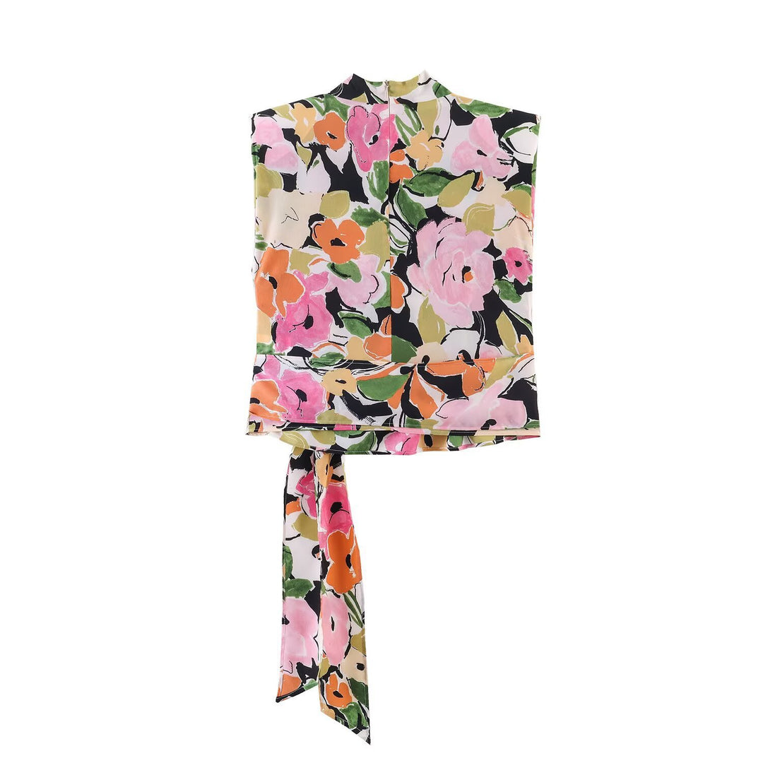 Damebluse med blomsterdesign og elegant knytning Skjora