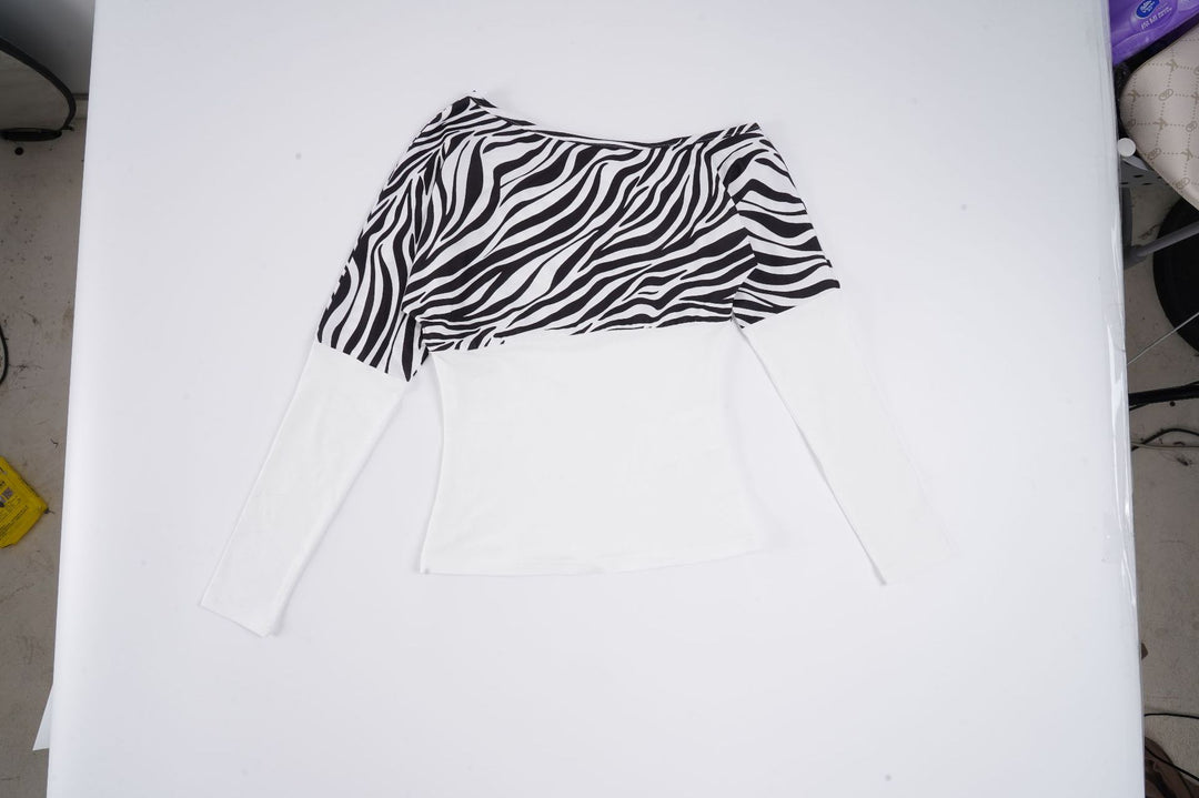 Dame asymmetrisk topp med trendy zebra-design og lang arm Skjora
