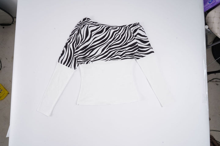 Dame asymmetrisk topp med trendy zebra-design og lang arm Skjora