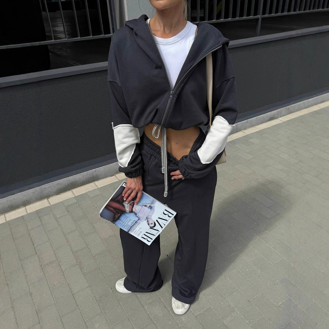 Kvinnors sportiga fritidsset med högskuren kort topp och eleganta sweatpants Skjora