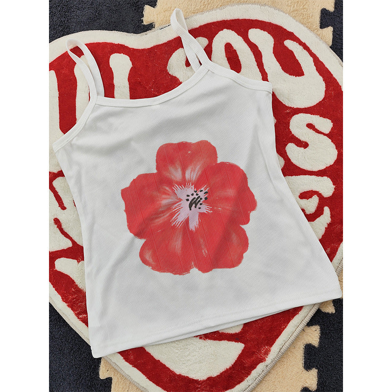 Damer ermeløs topp med blomsterlig hibiskus-motiv Skjora