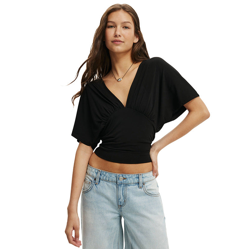 Damer elegant topp med avslappet snitt og trendy V-hals Skjora