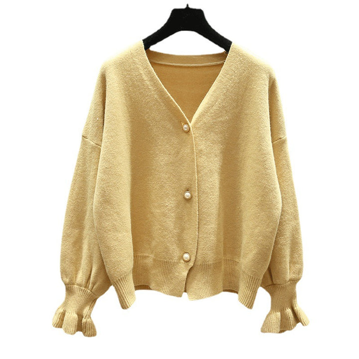 Dame cardigan med perleknapper og løs passform Skjora